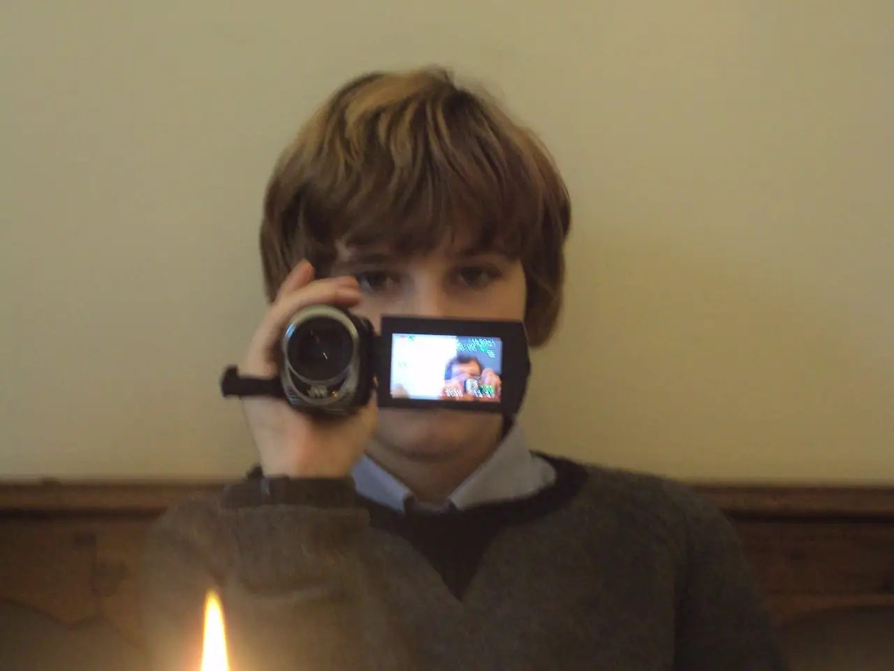 Picture of a young boy holding a camcorder