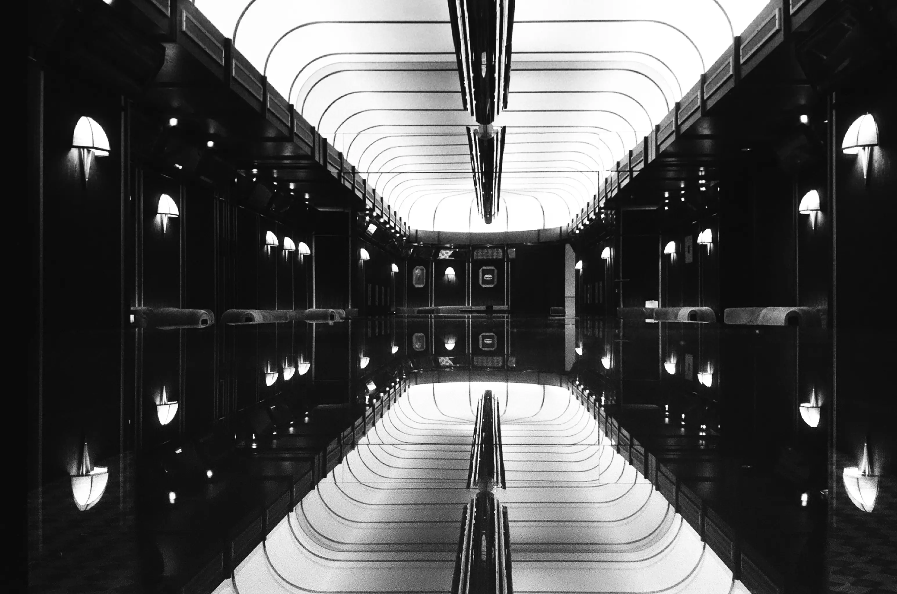 A room with a giant mirror in it.